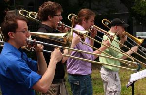 A traveling trombone quartet, TromBoston, played throughout Lynn on Saturday drawing people to downtown for a festival. Downtown Lynn's art scene is helping revitalize the area.