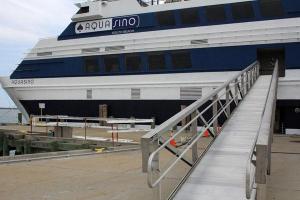 A 225-foot-ship 'Aquasino,' a gambling boat, docked in Lynn Wednesday as it prepares for a launch date in June to set sail with gambling customers.