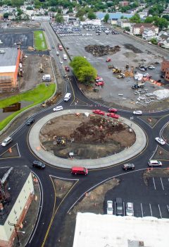 Cars drive around the new rotary in West Lynn