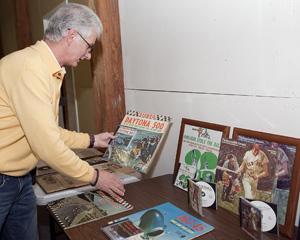 Wayne Terminello, president of Fleetwood Media Productions (formerly Fleetwood Records), displays some of his company’s popular old records at his office in Lynn. 
