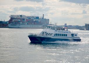 image of a ferry traveling on water