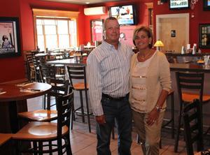 Rolly and Wendy Hayes, owners of the recently expanded Rolly’s Tavern in Wyoma Square. The restaurant is continuing improvements with an overhaul of its kitchen and plumbing. 