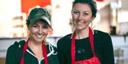 Casey White on left and Vanessa White standing in their pierogi shop