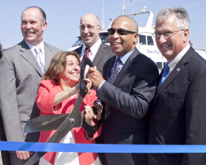 From left, Rep. Robert Fennell, Mayor Judith Flanagan Kennedy, EDIC Executive Director Jim Cowdell, Gov. Deval Patrick and Sen. Thomas McGee cut the ribbon for the ferry.
