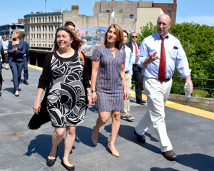 From left, Mayor Judith Flanagan Kennedy, Lt Gov. Karyn Polito and EDIC Director James Cowdell look over the downtown area from the train tracks.