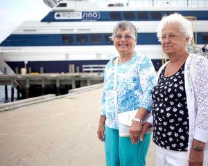 Alice St. Pierre and Sophia Grasso pose for a photo after their cruise on the Aquasino casino boat on Wednesday. Initial reviews are fairly positive for the floating casino.