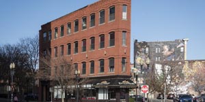 This historic four-story brick building in the downtown has been listed for sale at $1.1 million.